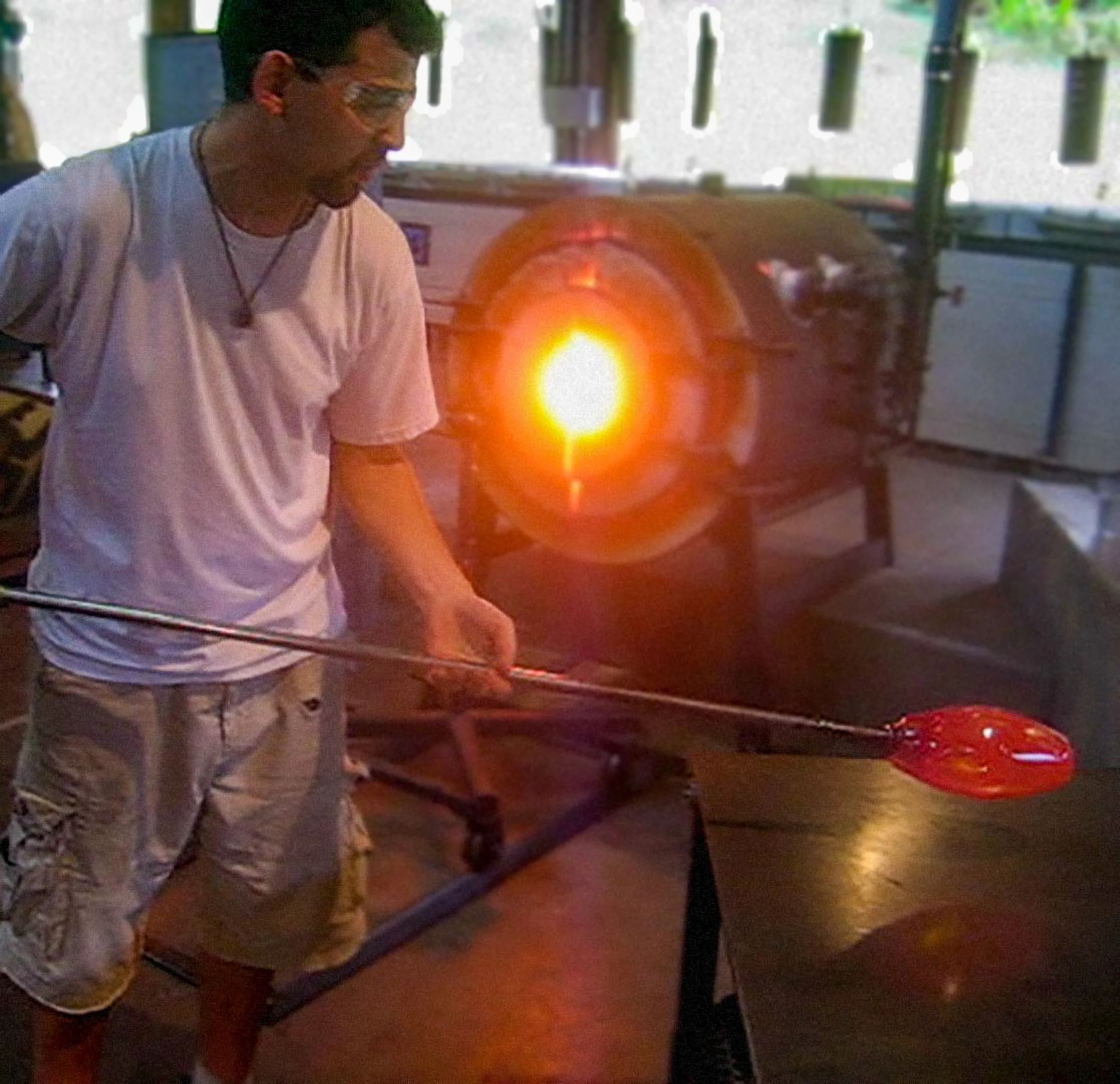 Glass artisan Stamati Charalambidis standing in his workshop